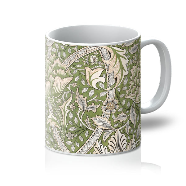 The William Morris mug, 'Windrush,' is an iconic botanical nature-inspired design by arts and crafts designer William Morris. A perfect gift for tea and coffee lovers, and ideal for your coffee table at home