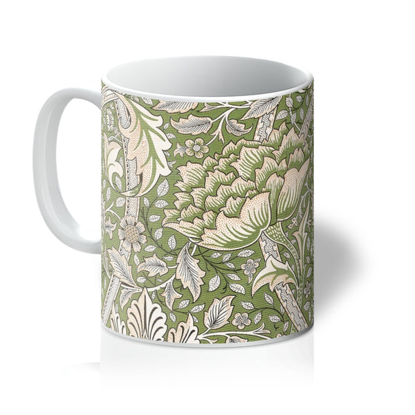 The William Morris mug, 'Windrush,' is an iconic botanical nature-inspired design by arts and crafts designer William Morris. A perfect gift for tea and coffee lovers, and ideal for your coffee table at home