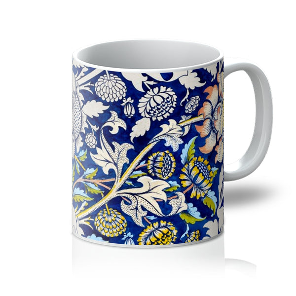 The William Morris mug, 'Wey,' is an iconic blue botanical nature-inspired design by arts and crafts designer William Morris. A perfect gift for tea and coffee lovers, and ideal for your coffee table at home