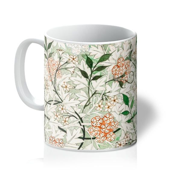 The William Morris mug, 'Jasmine,' is an iconic unfinished sketch of a nature-inspired design by arts and crafts designer William Morris. A perfect gift for tea and coffee lovers, and ideal for your coffee table at home